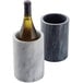 An American Metalcraft white marble wine cooler holding a bottle of wine.