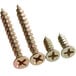 Three Lancaster Table & Seating screws for wood chairs and bar stools with a screwdriver.