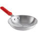 A Choice aluminum frying pan with a red silicone handle.