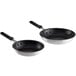 Two Choice aluminum non-stick frying pans with black silicone handles.