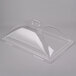 A Cambro clear plastic dome display cover with 1 end cut and a handle.