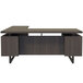 A Safco Mirella L-shaped desk in Southern Tobacco with drawers and shelves.