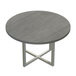 A Safco Mirella round conference table with a stone grey wood top and metal base.