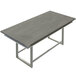 A Safco Mirella stone grey rectangular conference table with metal legs.