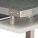 A close up of a Safco Mirella stone gray rectangular conference table with metal legs.