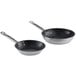 A pair of Vollrath Optio stainless steel frying pans.