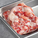 Frozen Boston Lobster Company lobster meat in a metal tray.