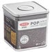 An OXO Good Grips square plastic food storage container with a stainless steel POP lid.