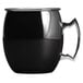 An Arcoroc black mug with a silver handle.