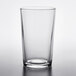 A clear glass with a white background.