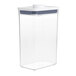An OXO clear plastic rectangular food storage container with a white lid.