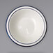 An International Tableware Danube stoneware bowl with blue bands on the rim.