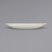 An ivory stoneware plate with a narrow rim on a white background.