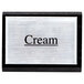An American Metalcraft cream sign with black lettering in a black frame.