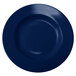 A cobalt blue stoneware bowl with a white background.