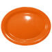 An orange oval International Tableware stoneware platter on a white background.