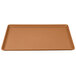 A brown rectangular Cambro dietary tray with a handle.