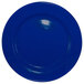 A cobalt blue stoneware plate with a white rim.