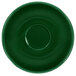 A green saucer with a circle in the middle.