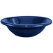A International Tableware cobalt blue stoneware bowl with a curved edge.
