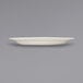 An International Tableware Roma ivory stoneware platter with a wide rim on a white surface