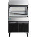 A silver and black Hoshizaki undercounter ice machine with a stainless steel finish.