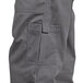 A close-up of a pocket on Uncommon Chef slate gray cargo chef pants.