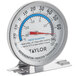 A white Taylor refrigerator / freezer thermometer with a blue and red dial.