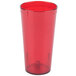 A close up of a Carlisle ruby red plastic tumbler.