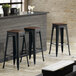 Lancaster Table & Seating Alloy Series Black Metal Indoor Industrial Cafe Bar Height Stool with Walnut Wood Seat Main Thumbnail 1