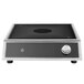 A stainless steel Vollrath countertop induction range with black knob controls.