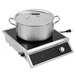 A Vollrath induction range with a pot on it.