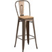 A Lancaster Table & Seating copper barstool with a natural wood seat.