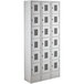 A gray Regency metal locker with 6 compartments.