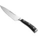 A Wusthof Classic Ikon chef's knife with a black handle.