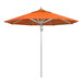 A California Umbrella with a Sunbrella Tuscan canopy on a metal pole.