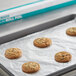 A tray of Choice aluminum foil-wrapped cookies on a baking sheet.