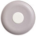 A white porcelain saucer with a gray speckled rim and a white circle in the middle.
