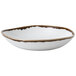 A white Dudson china bowl with a brown rim.