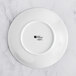 A Sant'Andrea Francia bright white porcelain bowl with an embossed rim.