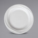 A Sant'Andrea Pensato bright white porcelain plate with an embossed wavy rim.