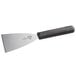 A Mercer Culinary grill scraper with a black handle and silver blade.