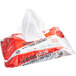 A red and white package of WipesPlus surface sanitizing wipes.