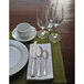A table set with a Sant'Andrea Bellini oval bowl soup spoon, plate, and silverware.