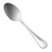 A close-up of a Sant'Andrea Bellini stainless steel serving spoon with a silver handle.