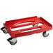A red Cambro Camdolly with black wheels.