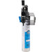 A Hoshizaki triple water filtration system with blue and black plastic parts.