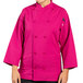 A woman wearing a berry colored 3/4 length sleeve chef coat with side vents.