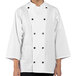 A person wearing a white Uncommon Chef 3/4 length sleeve chef coat with buttons and a collar.