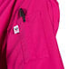A pink chef coat with a front pocket.